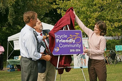 Bill Haslam, left, helps unveil a sign announcing Knoxville as a Bicycle Friendly Community. ##http://www.bikeknoxville.blogspot.com/##Bike Knoxville##