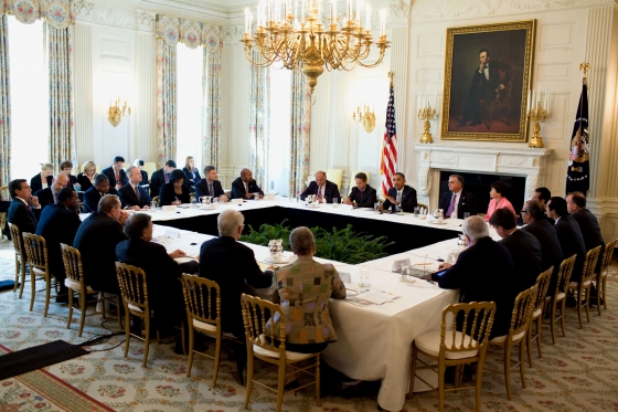 The official ##http://www.whitehouse.gov/blog/2010/10/11/president-infrastructure-investment-work-needs-be-done-there-are-workers-who-are-rea##White House## photo of the president's meeting on infrastructure. That's Angela Glover Blackwell in the center, in the gold-checkered jacket.
