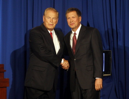 Strickland, left, and Kasich share an awkward handshake before a debate. Image: ##http://www.cleveland.com/open/index.ssf/2010/09/ohio_gov_ted_strickland_and_ch.html##Columbus Dispatch##