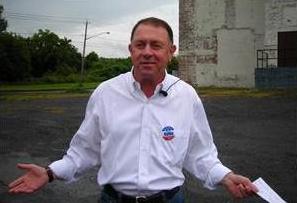 Richard Hanna outside the old GE building in Utica. Image: ##http://www.uticaod.com/elections/x201793203/Hanna-running-for-Congress-again##Bryon Ackerman / Utica Observer-Dispatch##