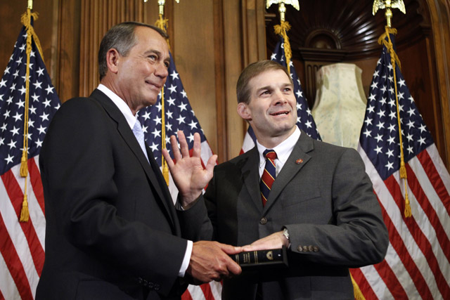 Jim Jordan, R-Ohio, is sworn in by House Speaker John Boehner Jan. 5, 2011. Jordan is sponsoring the Spending Reduction Act. Photo: ##http://www.investors.com/NewsAndAnalysis/Article/560463/201101201926/Slash-10-Year-Spending-By-25-Trillion-Conservative-GOP-Lawmakers-Propose-.htm##AP##