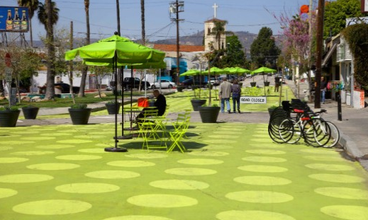 The NACTO Urban Street Design Guide instructs engineers how to design pedestrian plazas, like this one in Los Angeles. Image: ##http://inhabitat.com/sunset-triangle-plaza-las-first-pedestrian-plaza-conversion-is-now-open/## Inhabitat##