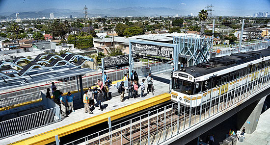USC researchers called the changed in travel behavior following the introduction of L.A.'s Expo light rail line "striking." Image: ##http://zev.lacounty.gov/news/transportation/bus-rail/expo-orange-line-ridership-on-a-roll## L.A. County##