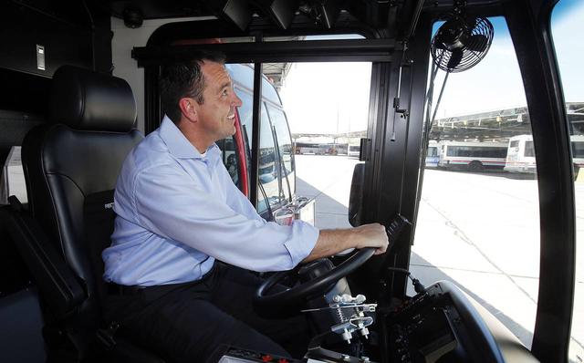 UTA board chair, State Rep. Greg Hughes, sits in the driver's seat of a UTA bus. Photo: Ravell Call/##http://m.deseretnews.com/photo/865583219##Deseret News##