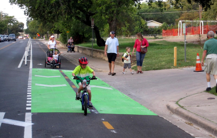 The Bluebonnet protected bike lane in Austin serves children riding to Zilker Elementary. Image: ##http://www.peopleforbikes.org/blog/entry/what-if-bike-comfort-is-more-important-than-bike-safety## People for Bikes##