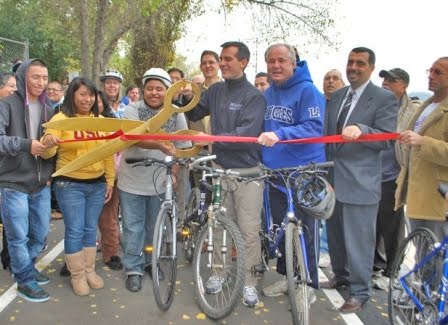 The next bike-facility ribbon-cutting could be in your community, if you know how to sell funders on the benefits. Photo: ##http://lacityorgcd13.blogspot.com/2010_12_01_archive.html##Eric Garcetti##