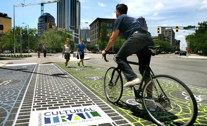 The Indianapolis Cultural Trail is one of many game-changing, innovative projects that the TIGER grant program has helped create. Under U.S. DOT's bill, TIGER would become a permanently authorized program with $5 billion to spend over four years. Photo: ##http://www.urbanindy.com/2010/11/18/pedestrianizing-downtown-indianapolis/##UrbanIndy##