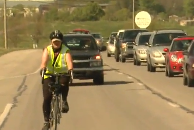 Cherokee Schill was ticketed three times for riding her bike to work in Kentucky. This week a judge ruled in her favor. Image: WKYT
