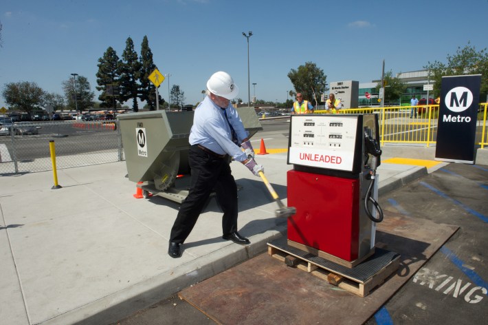 L.A. Metro Transportation Authority CEO Art Leahy smashing a gas pump yesterday. Photo courtesy of Gary Leonard, L.A. Metro