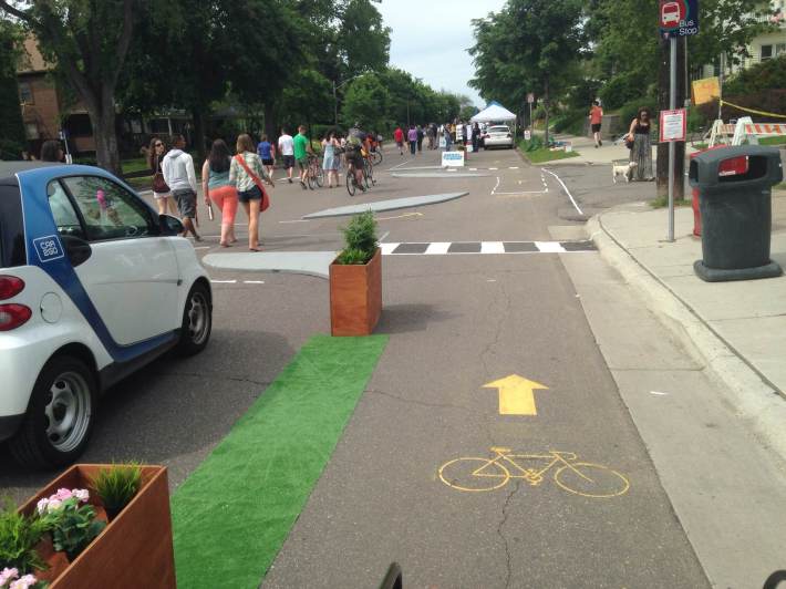 The Minneapolis Bicycle Coalition installed this pop-up lane and intersection treatment at an Open Streets event to show neighbors what a protected bike lane could look like.