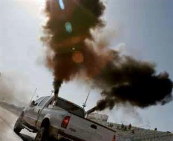 Rolling coal is super fun, if poisoning the planet and endangering everyone else on the road is your idea of fun. Photo: ##https://www.facebook.com/RollinCoalandRaisinHell/photos/pb.562903110418434.-2207520000.1404834615./578932172148861/?type=3&theater##Facebook/Rollin Coal and Raisin Hell##