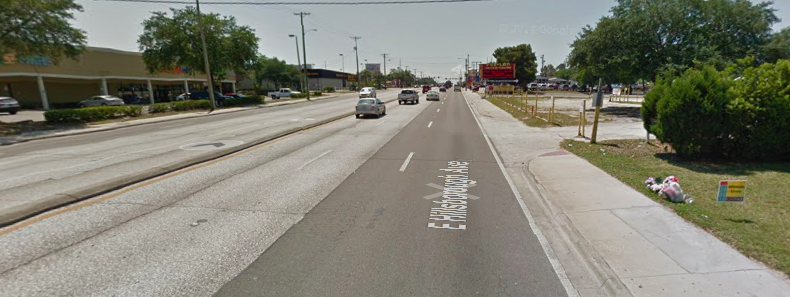 You can see, on the right hand side of this image, a memorial to one of two teenage girls killed while trying to cross Hillsborough Avenue in Tampa. Image: Google Maps