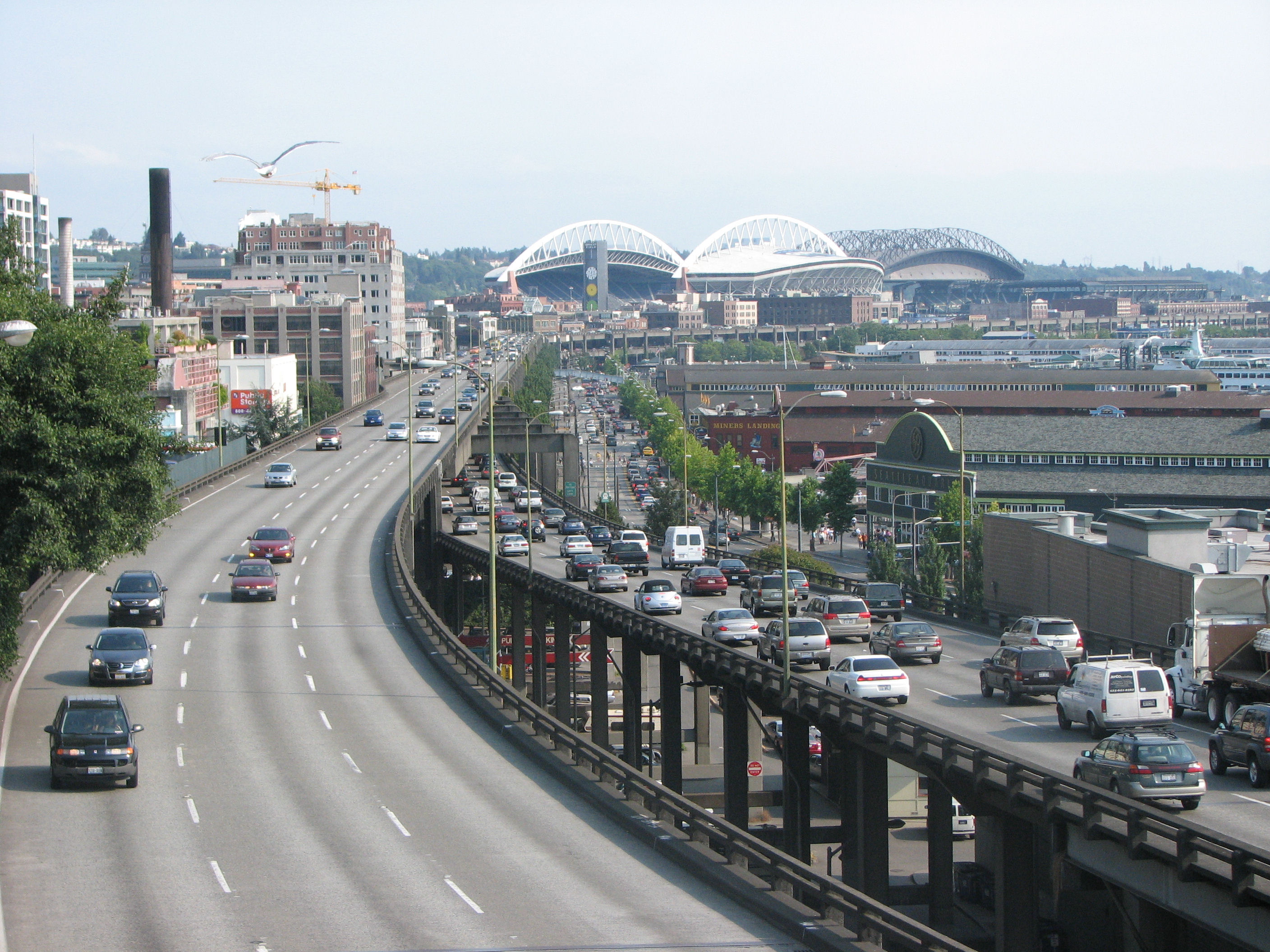 The Alaskan Way Viaduct, damaged decades ago, will be rebuilt as a double-decker highway, even though a transit-heavy alternative would have been at least as effective at reducing congestion. Photo: Rootology/##http://en.wikipedia.org/wiki/Alaskan_Way_Viaduct#mediaviewer/File:The_Alaskan_Way_Viaduct.jpg##Wikimedia##