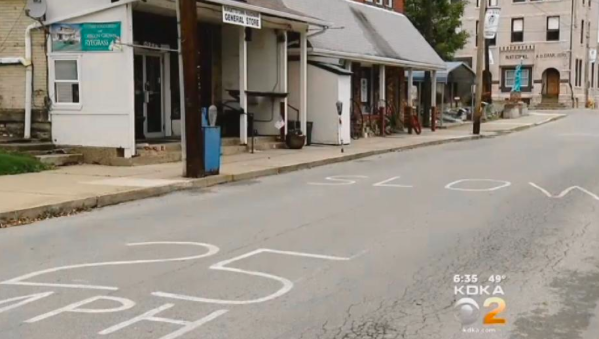 A Pennsylvania man was charged with criminal mischief for painting this sign in front of his business. Photo: KDKA Channel 2