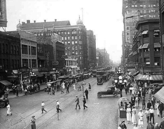 A hundred years ago, it wasn't taken for granted that the main purpose of a street was to let automobiles go fast. Photo via Peter Norton