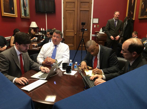 House Transportation and Infrastructure Committee Chair Bill Shuster (center, in white) and U.S. Transportation Secretary Anthony Foxx (right, in the red tie) held a Twitter town hall to promote a long-term transportation funding plan. Photo: Bill Shuster via Twitter