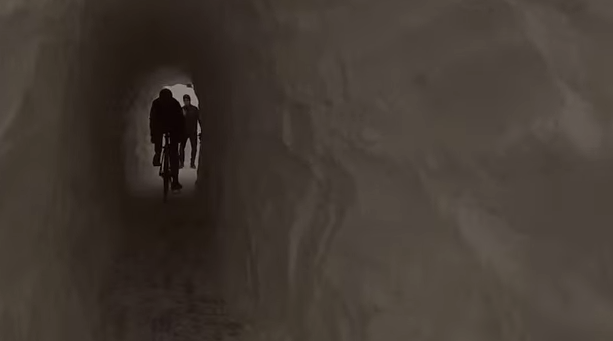 This 40-foot snow tunnel, built by Boston cyclists, made a biking and walking path useful again. Image: Dragonbeard on Youtube