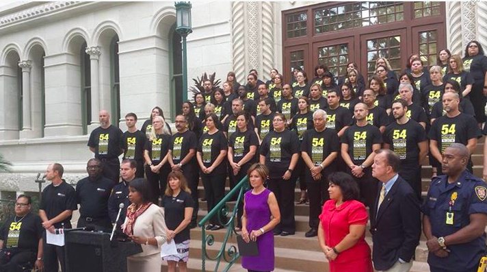 Fifty-four people stood on the steps of San Antonio's City Hall, one for each pedestrian killed on city streets in the past year. The demonstration marked the start of the city's Vision Zero effort, aimed at entirely eliminating traffic deaths. Photo: San Antonio Fire Department