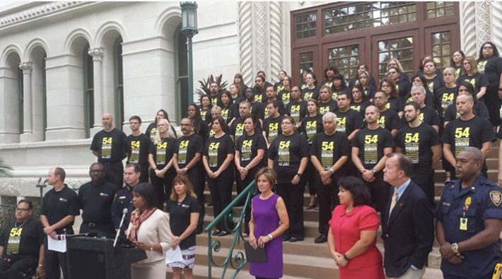 Fifty-four people stood on the steps of San Antonio's City Hall, one for each pedestrian killed on city streets in the past year. The demonstration marked the start of the city's Vision Zero effort, aimed at entirely eliminating traffic deaths. Photo: San Antonio Fire Department