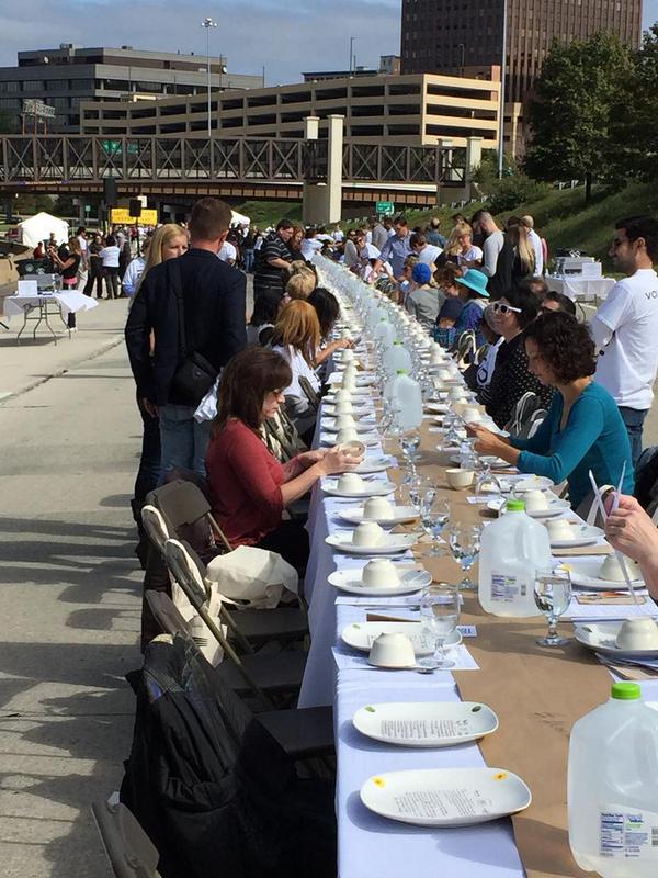 "500 Plates" brought together people from all over Akron to have a meal together on the to-be-closed "Innerbelt Freeway." Photo: Jason Segedy