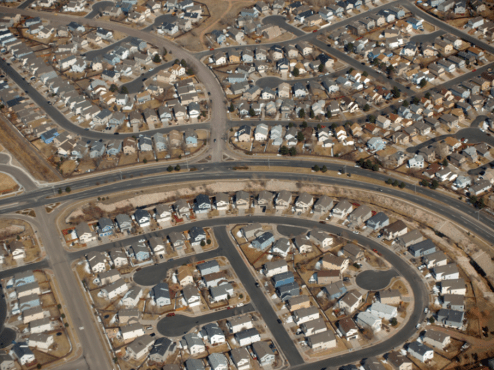 Build a house in sprawl in Calgary, pay a fee. Photo: Wikipedia