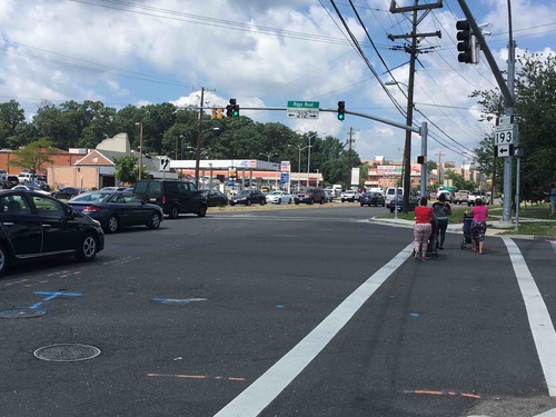 Wide, high-speed arterial roads like this are extremely dangerous to pedestrians. But road conditions are almost never mentioned in local reporting. Photo: Sean Emerson via Strong Towns