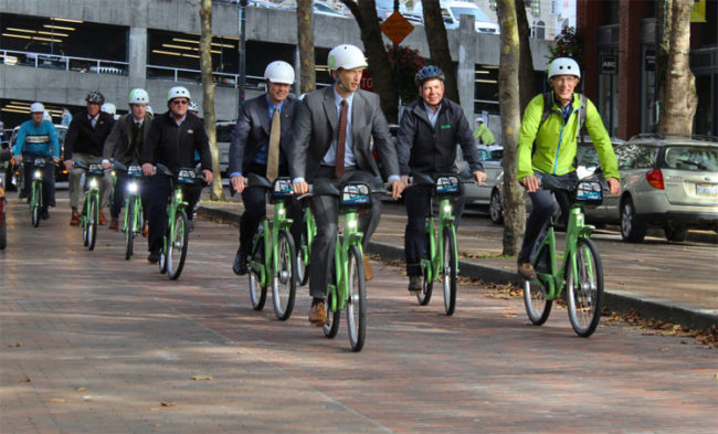 Seattle Mayor Ed Murray, second from right, on a ride to inaugurate Pronto bike-share two years ago.