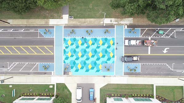 Memphis' Manassas Street was redesigned in Memphis with protected bike lanes and raised colorful crosswalks. Photo: Memphis Medical District Collaborative