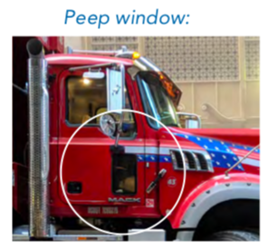 Trucks can be retrofitted with "peep" windows like this to improve visibility. Photo: NATCO