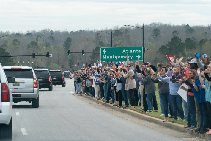President Trump's SUV motorcade makes its way through Lee County, Alabama