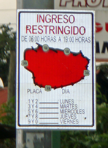 A road space rationing sign. Numbers on the bottom left indicate the last license plate numbers that are allowed to travel on designated dates. Source: Miovision.