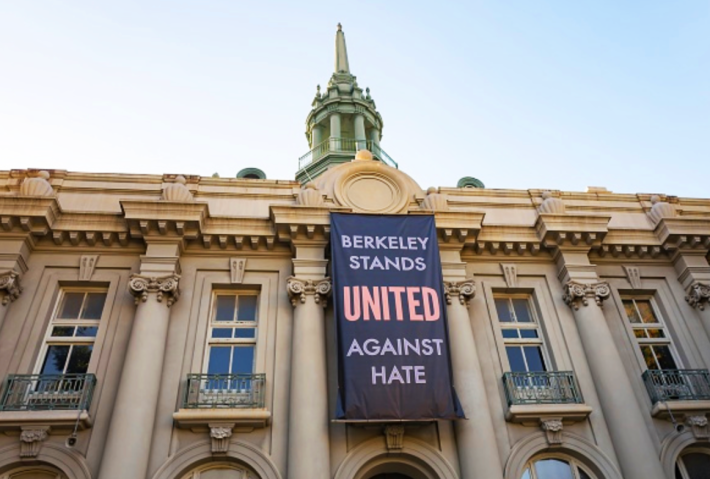 A poster adorns the Old City Hall building in Berkeley, California in 2017. Photo: Smith Collection/Gado/Getty Images