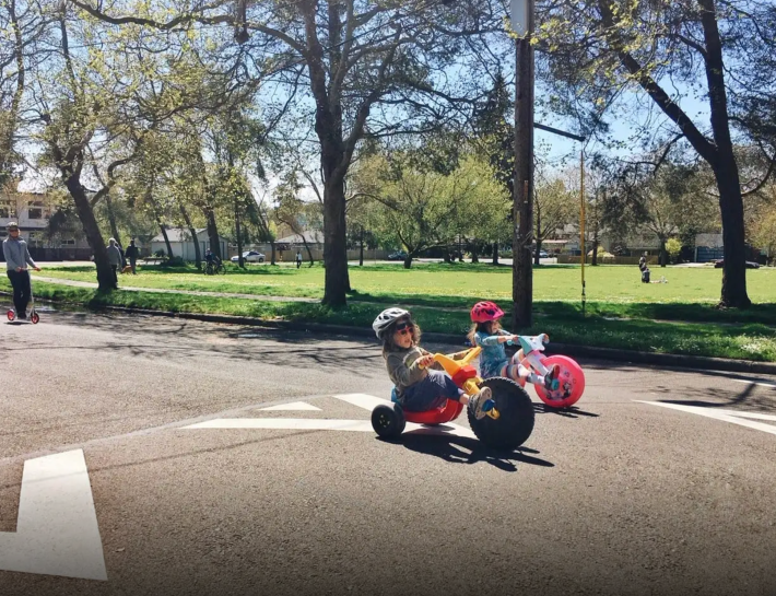 A “Stay Healthy” open street being put to good use by two young Seattleites. Photo: SDOT