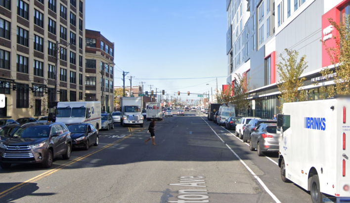 A pedestrian crossing a five-lane section of Washington Avenue, via Google Maps