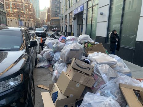 https://lede-admin.usa.streetsblog.org/wp-content/uploads/sites/46/2022/03/garbage-bags-with-pedestrian1a-1-rotated-1.jpg?w=464