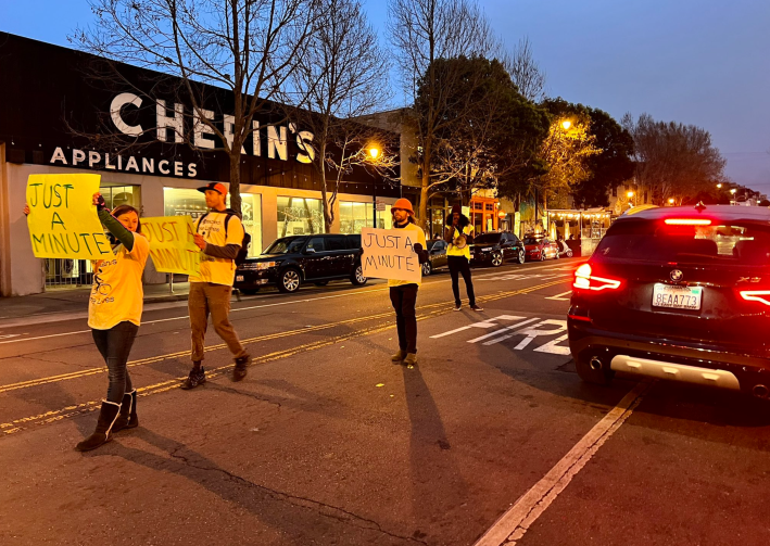 A "Just a Minute!" protest against drivers parking in bike lanes. Photo: Safe Street Rebel