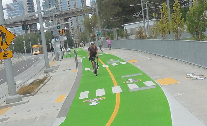 Caption: Portland has been expanding its network of protected bikelanes, as shown here, with 73km planned by 2025. Source: Portland Department of Transportation
