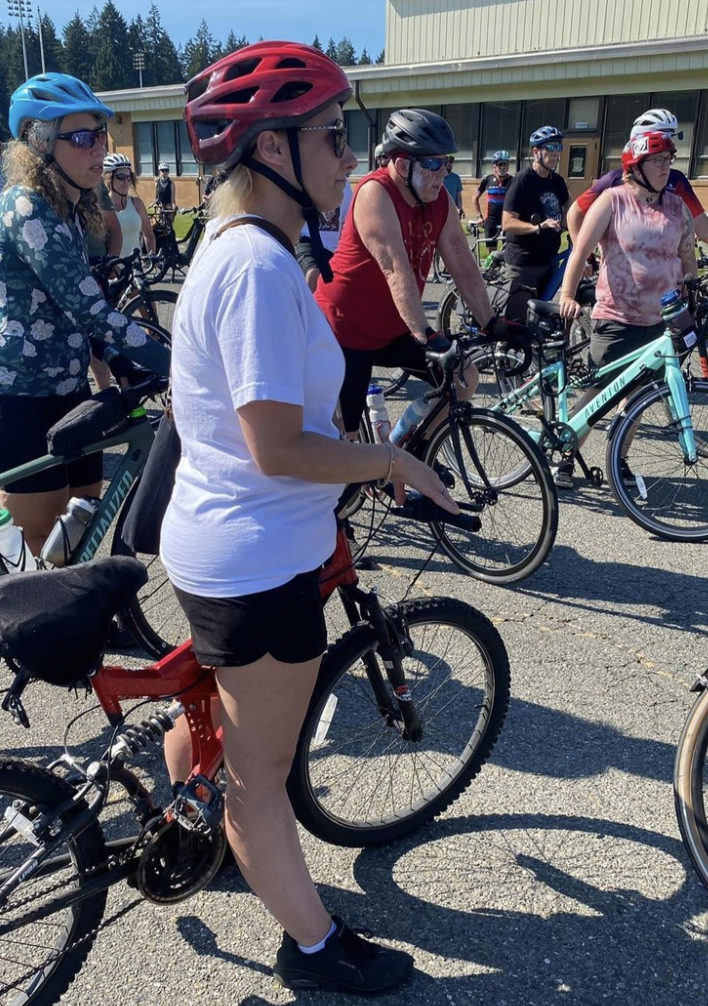 People gather for a silent bike ride in memory of Michael Weilert. Photo: Carla Gramlich