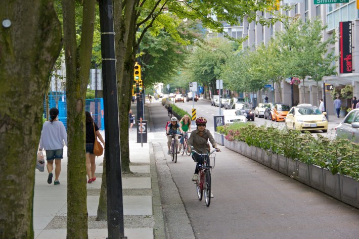 Figure 3. In Vancouver, planter boxes often separate protected bicycle lanes from motorized traffic. Photos: Paul Krueger.